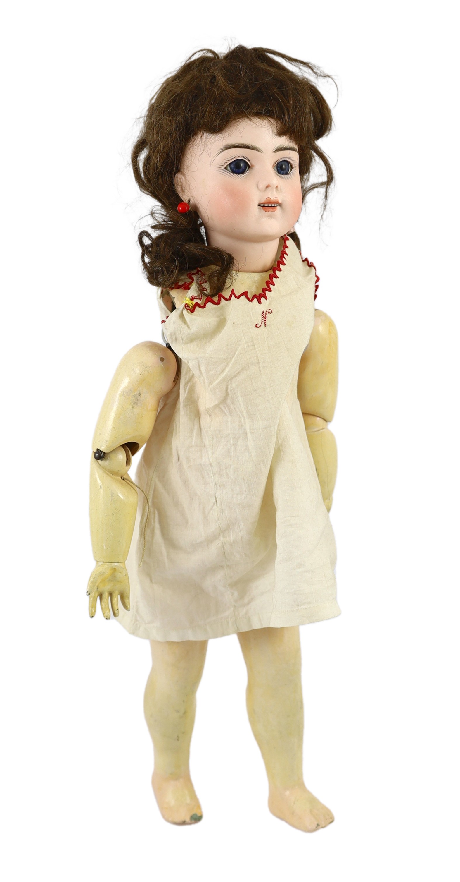 A Bru Jeune R bisque doll, French, circa 1890, 21in.